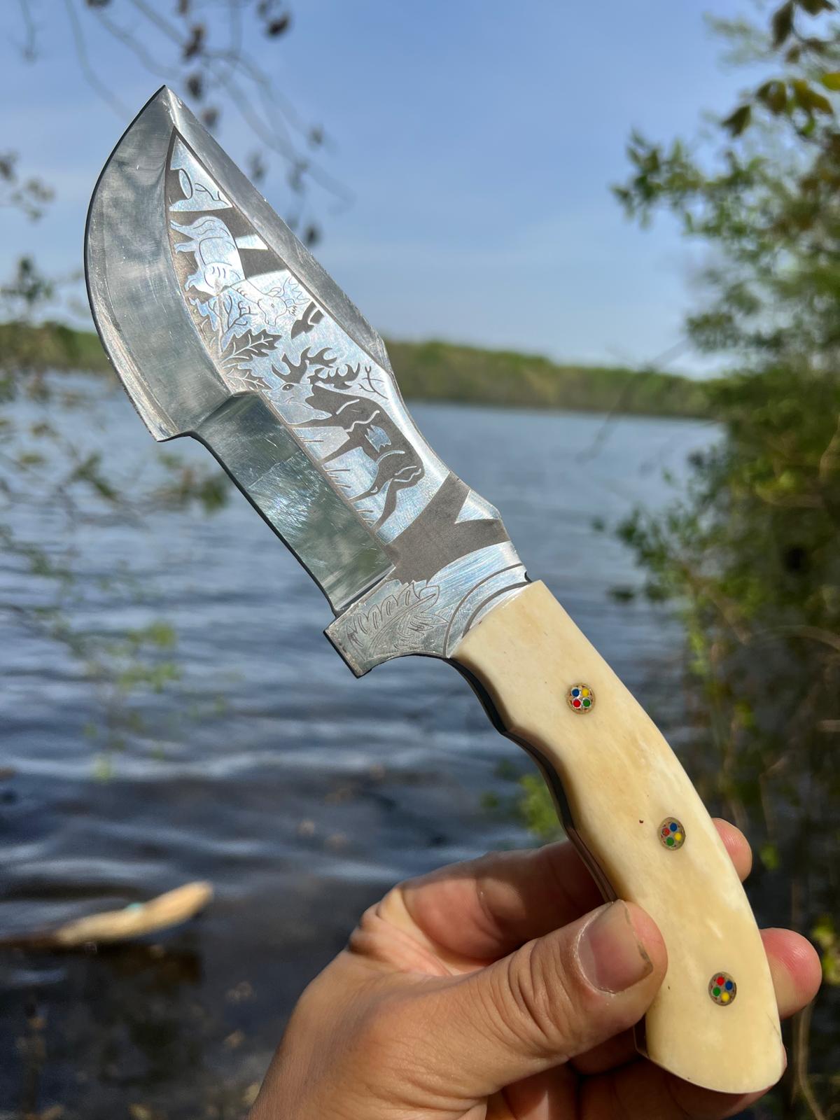 Handcrafted Hunting Knife with Engraved Wildlife Blade and Bone Handle